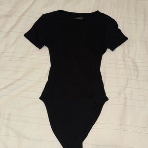 Backless black bodysuit